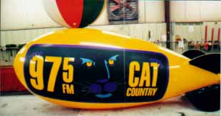 giant advertising blimps - Cat Country logo
