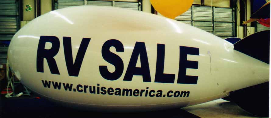 Advertising Blimp - RV SALE logo. Big helium balloons made in the USA.